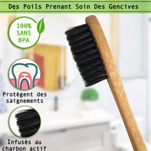 Charger l'image dans la galerie, Brosse à dents en bambou naturel avec poils souples, conçue pour protéger les gencives et infusée au charbon actif.