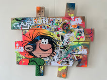 Charger l'image dans la galerie, Pop art tableau featuring Gaston Lagaffe with vibrant colors, textures, and playful expressions on palette wood.