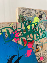 Charger l'image dans la galerie, Contemporary pop art Daffy Duck artwork on wood with vibrant colors and eclectic mixed media.