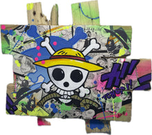 Charger l'image dans la galerie, "Handcrafted One Piece pop art tableau on custom wooden palette base, featuring manga collages and vibrant acrylic paint details."