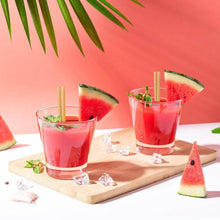 Charger l'image dans la galerie, Refreshing watermelon cocktails served in glasses with eco-friendly straws, garnished with mint leaves.