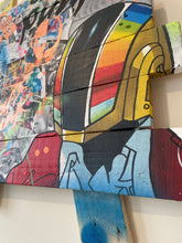 Charger l&#39;image dans la galerie, Close-up of POP Art collage featuring Daft Punk characters on palette wood, blending vibrant colors and textures.